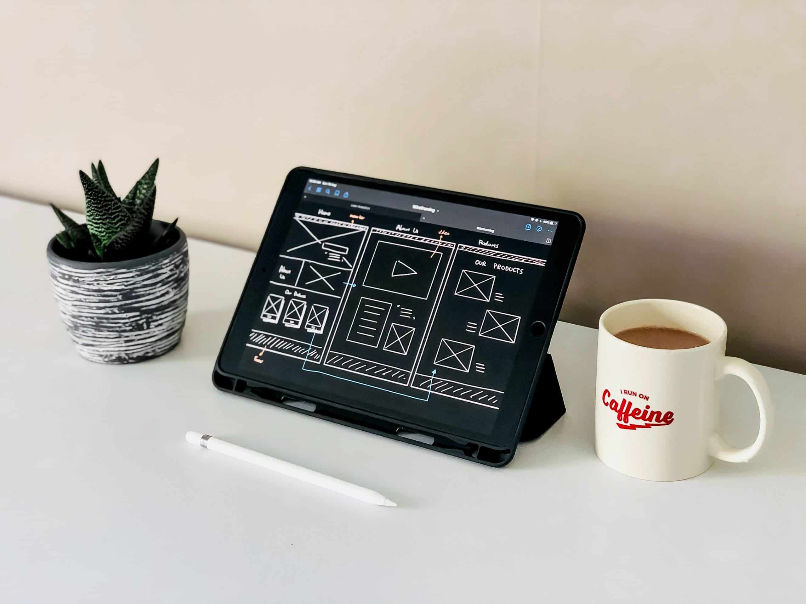 visual-design-pl9DrjAMV6I-unsplash ipad with design structure